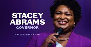 Governor Stacy Abrams speaking on the mic