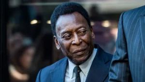 Pele attending a conference meeting
