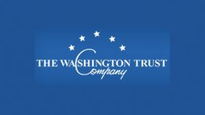 A blue background with white lettering that says the washington trust company.