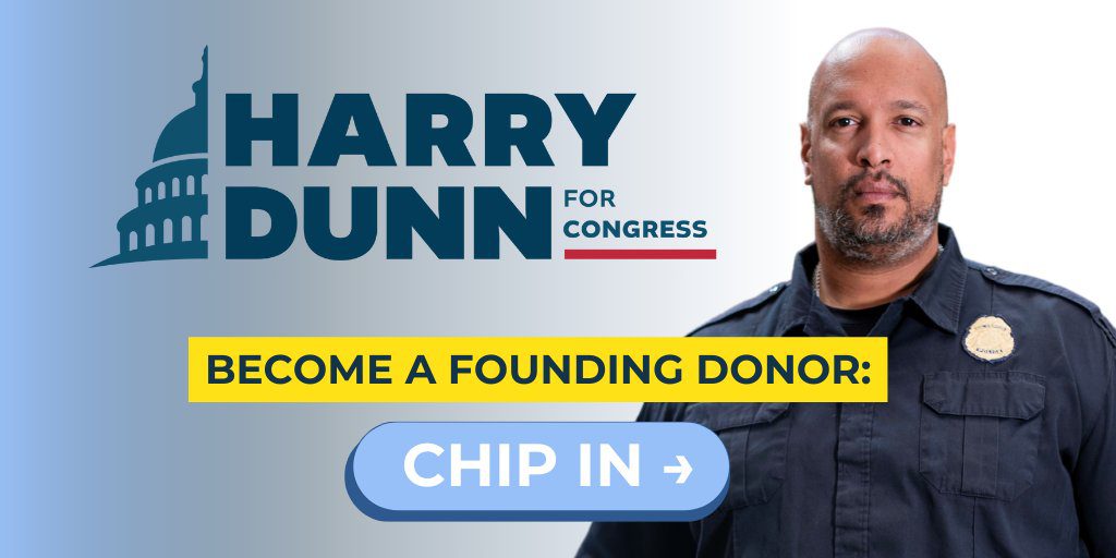 A man standing in front of the harry dunn for congress logo.