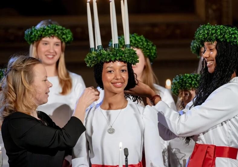 St. Lucia procession with lit candles.