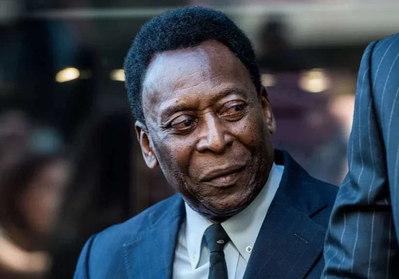 Pele attending a conference meeting