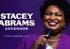 Governor Stacy Abrams speaking on the mic