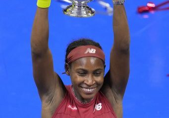 Coco Gauff, of the United States, poses for photograph after defeating Aryna Sabalenka, of Belarus, during the women's singles final of the U.S. Open tennis championships, Saturday, Sept. 9, 2023, in New York. (AP Photo/John Minchillo)