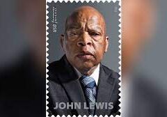 A stamp of john lewis is shown.